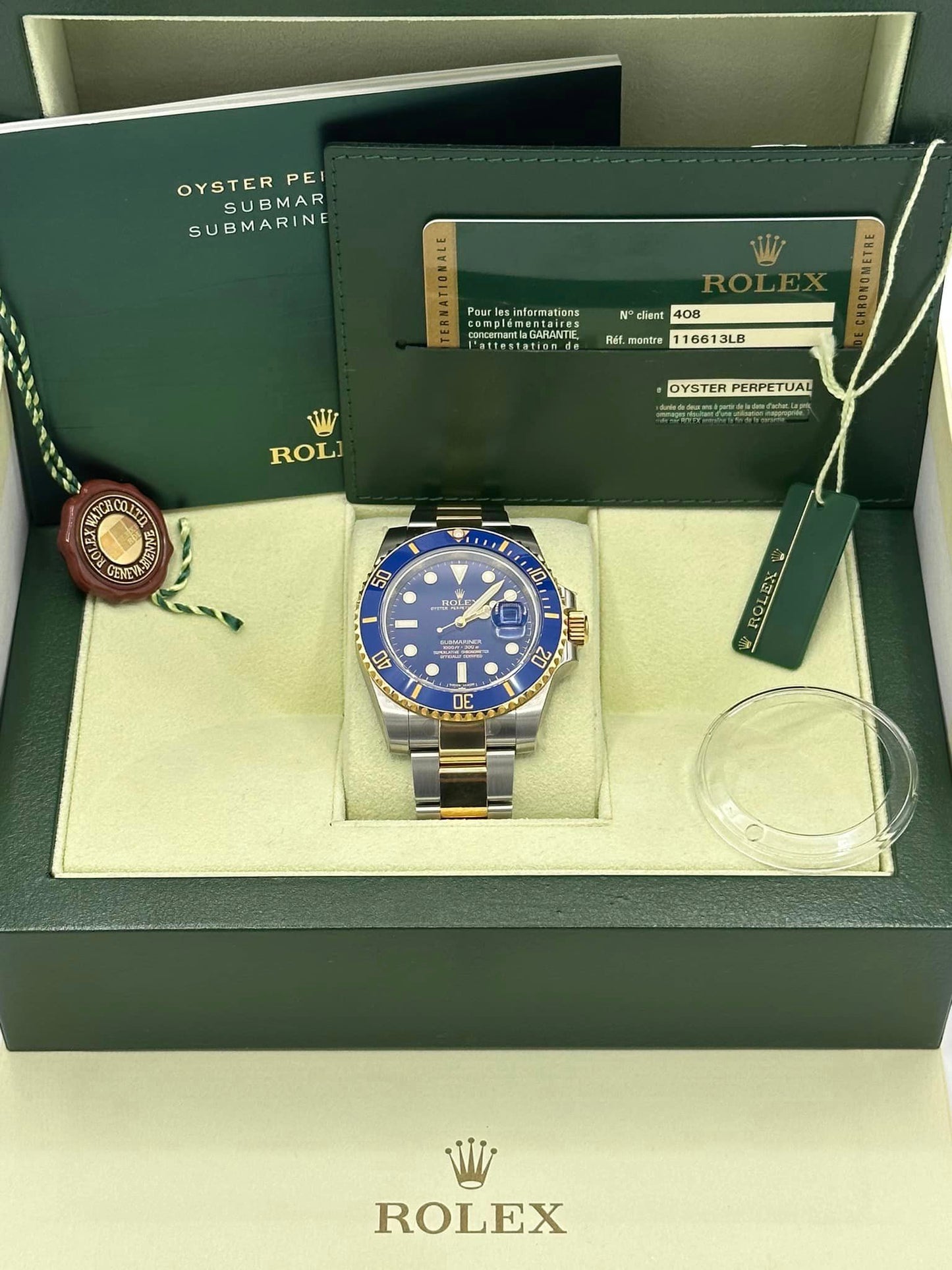 NEW OLD STOCK 2012 Rolex Submariner 116613LB RARE FLAT BLUE DIAL - MyWatchLLC