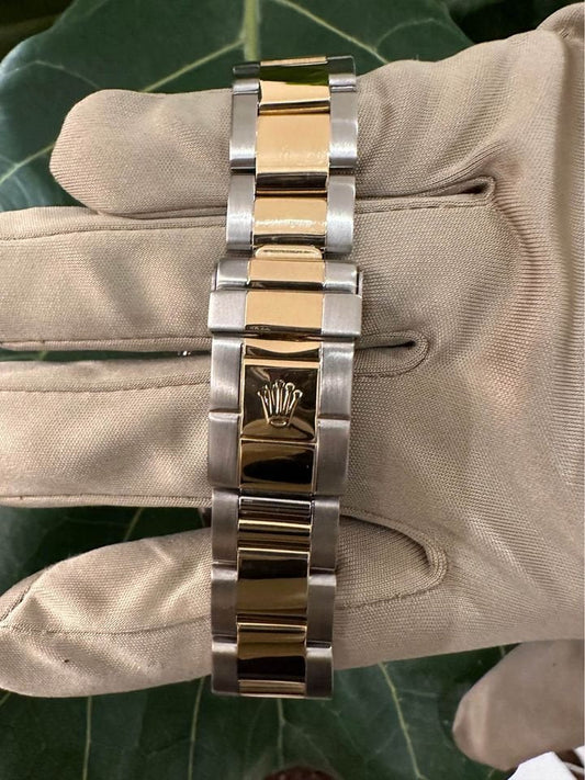 2005 Rolex GMT Master-II 16713 Grey Serti Diamond Ruby Dial TT Oyster - MyWatchLLC