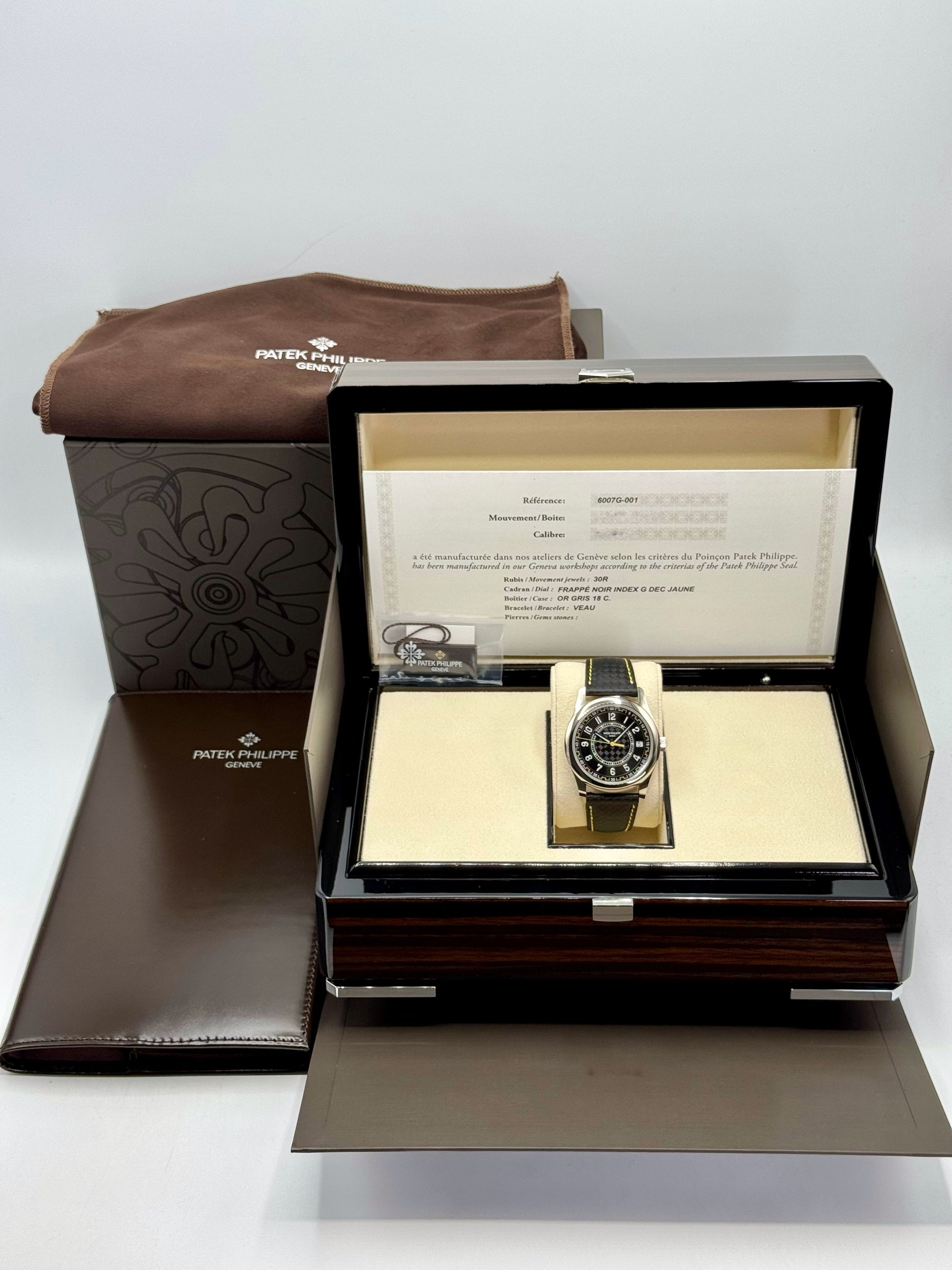 NEW 2024 Patek Philippe Calatrava 40mm 6007G White Gold Black Dial - MyWatchLLC